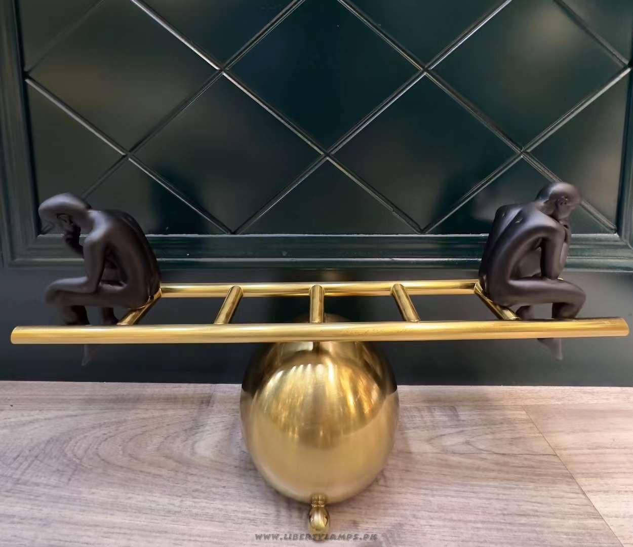 Thoughtful Balance on Ladder Decor Piece